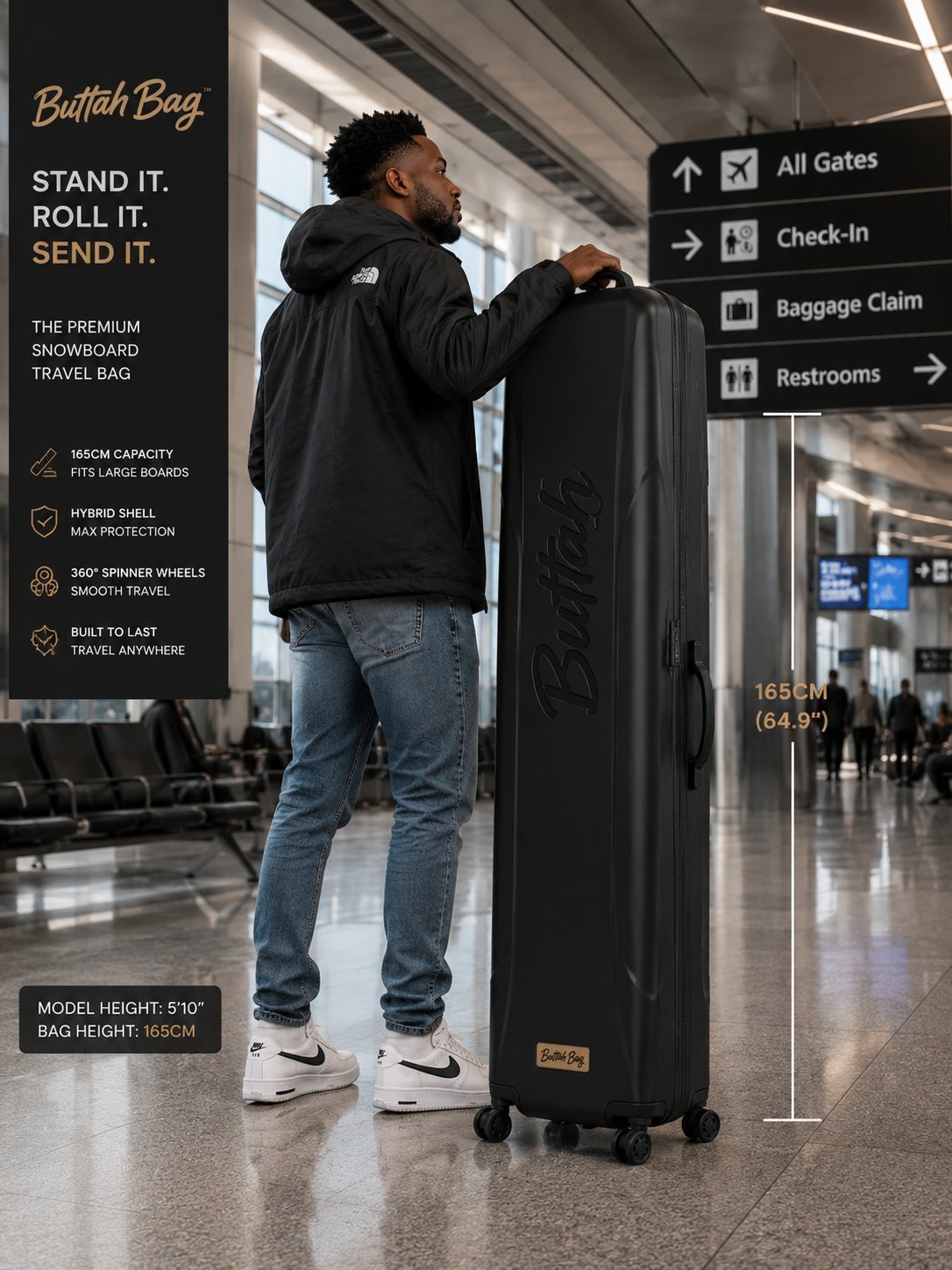 Man in black jacket standing with large black Baitiuh Beag snowboard travel bag in an airport terminal